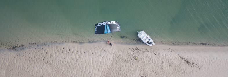 top view of a kiter on a beach