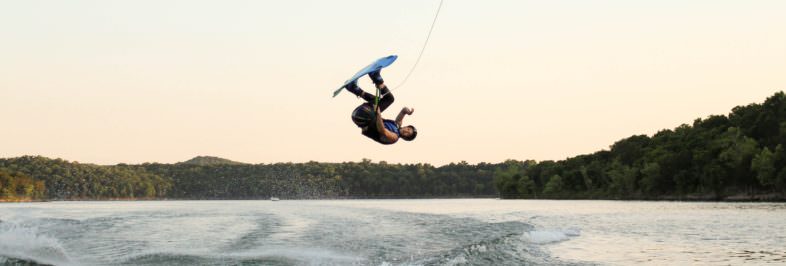 wakeboarder jumping on a wave