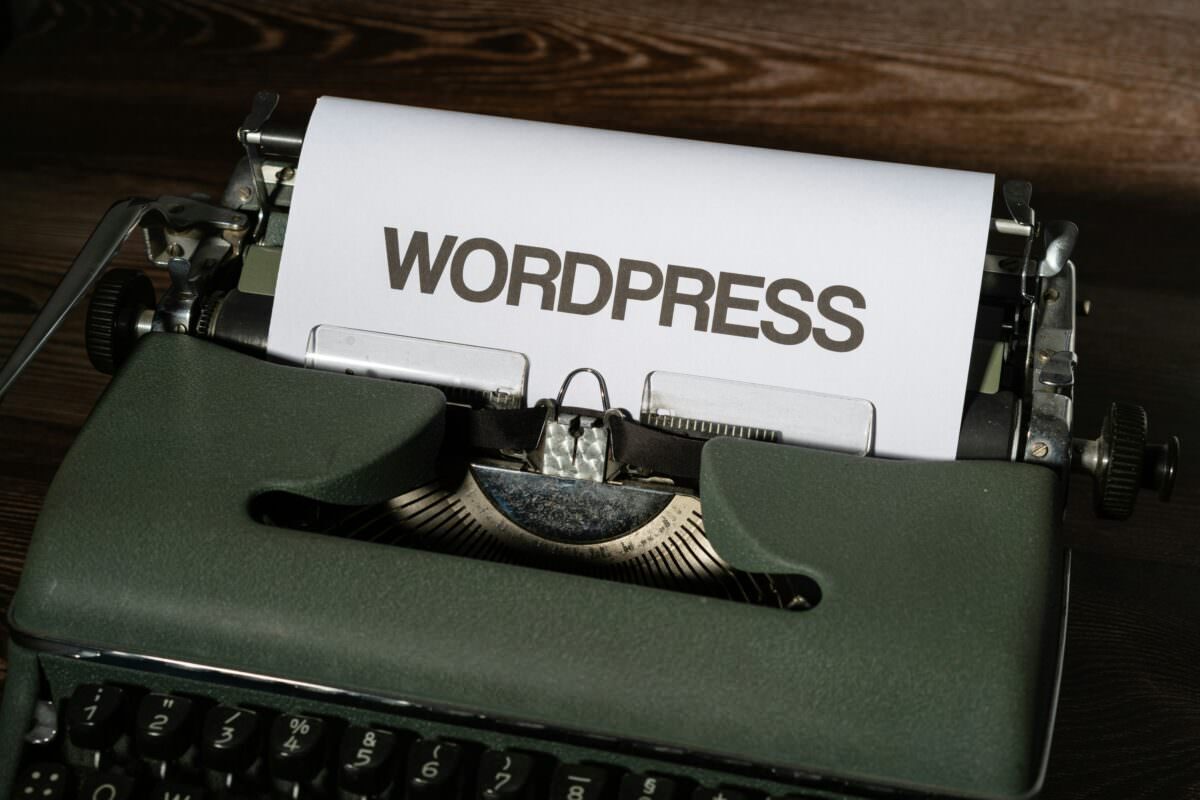 typewriter printing the word WordPress